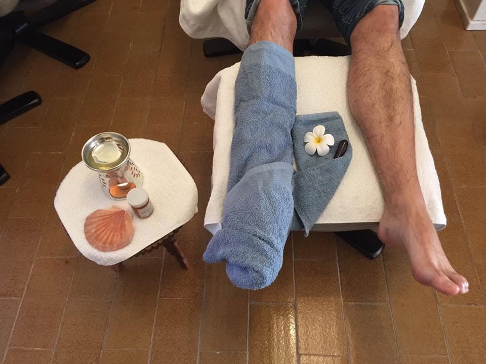 A guest relaxing with their feet up, part of the wind-down after a long journey
