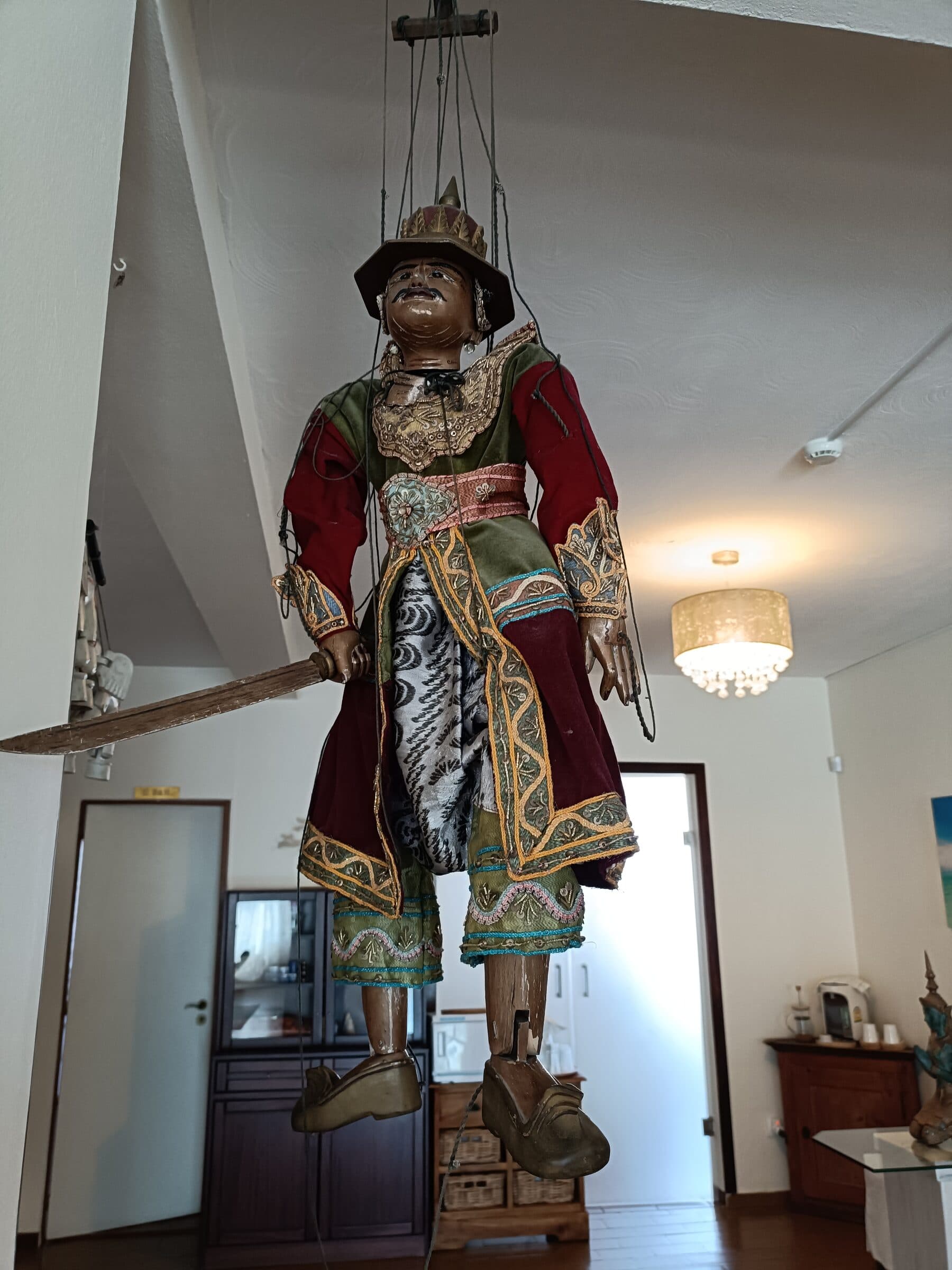 A traditional Thai marionette puppet on display