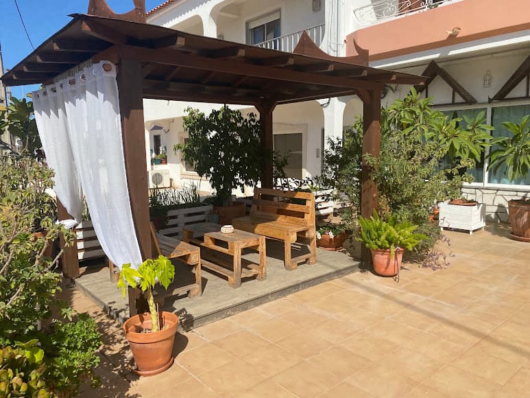 The covered pergola seating area
