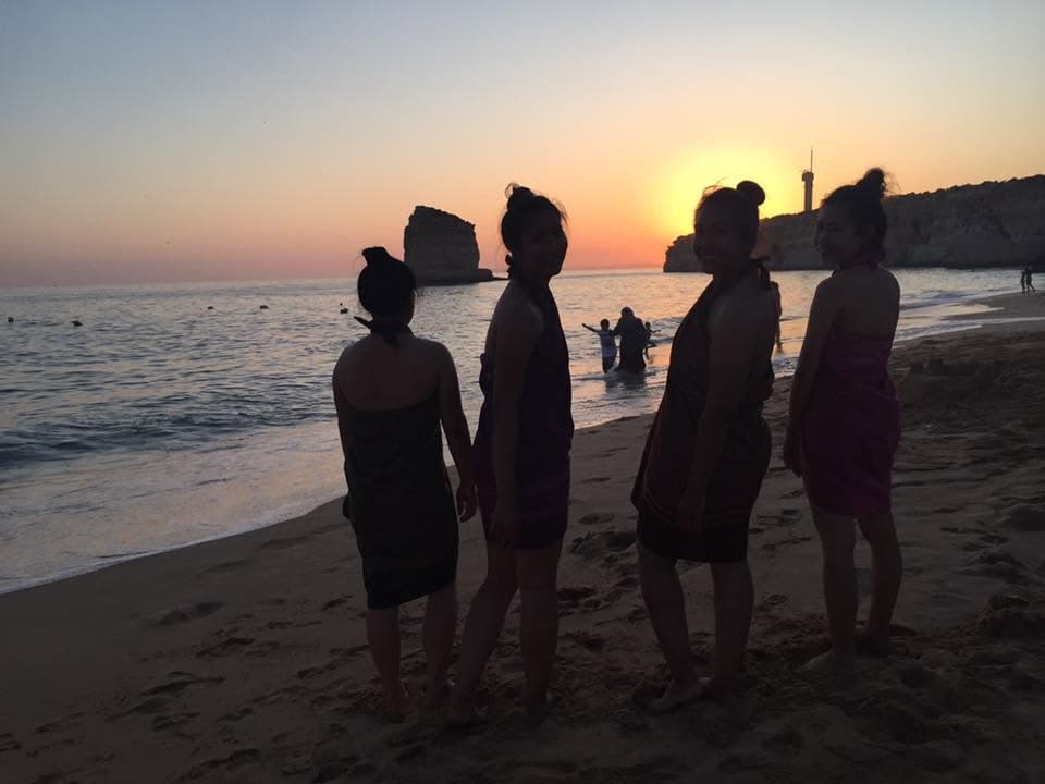 The team watching a sunset together